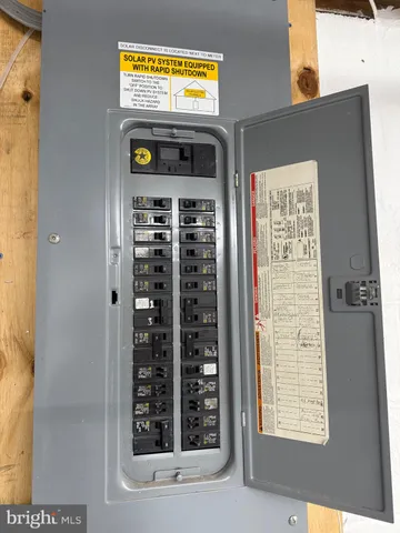 a view of an empty room with stairs