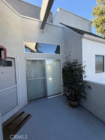 a kitchen with cabinets and stainless steel appliances