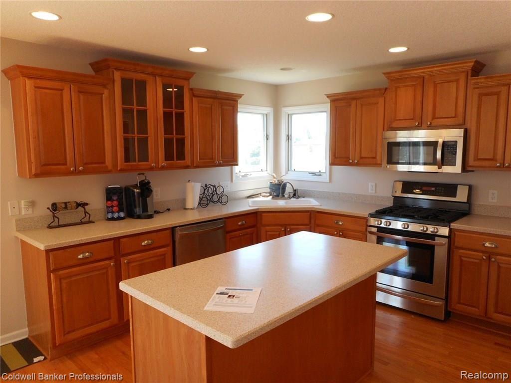 767 West Brocker Road Metamora, MI 48455 - Photo 14 of 62 Beautiful day light around corner sink. Not hurting for counter space. Great kitchen for the entertainer.