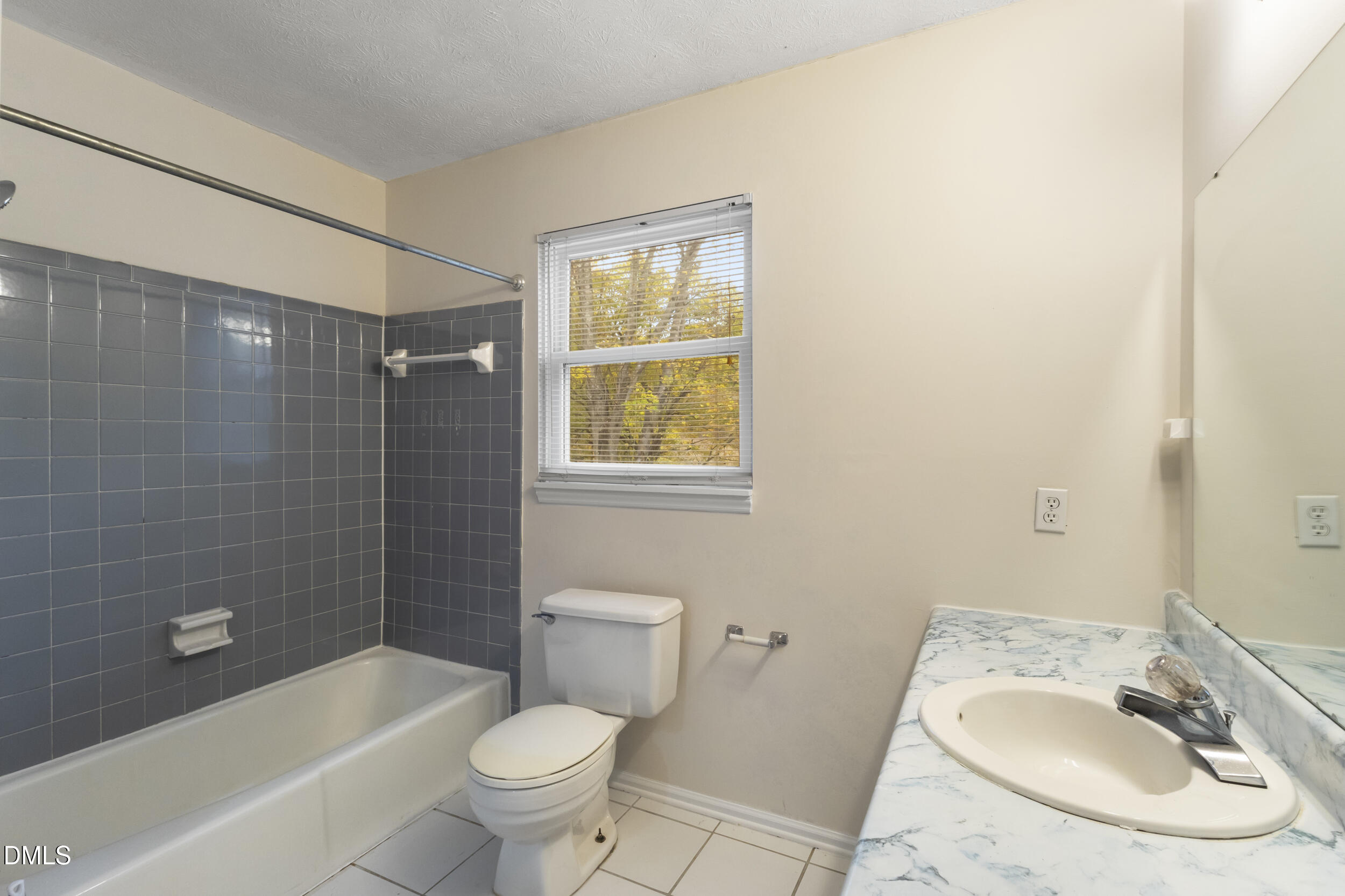 2001 Shenandoah Road Raleigh, NC 27603 - Photo 18 of 27 a bathroom with a sink toilet and shower