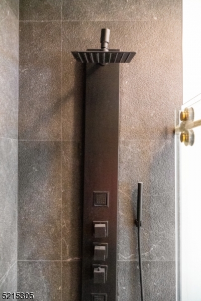 11 Washington Street, Unit B Montclair, NJ 07042 - Photo 18 of 20 a bathroom with a shower