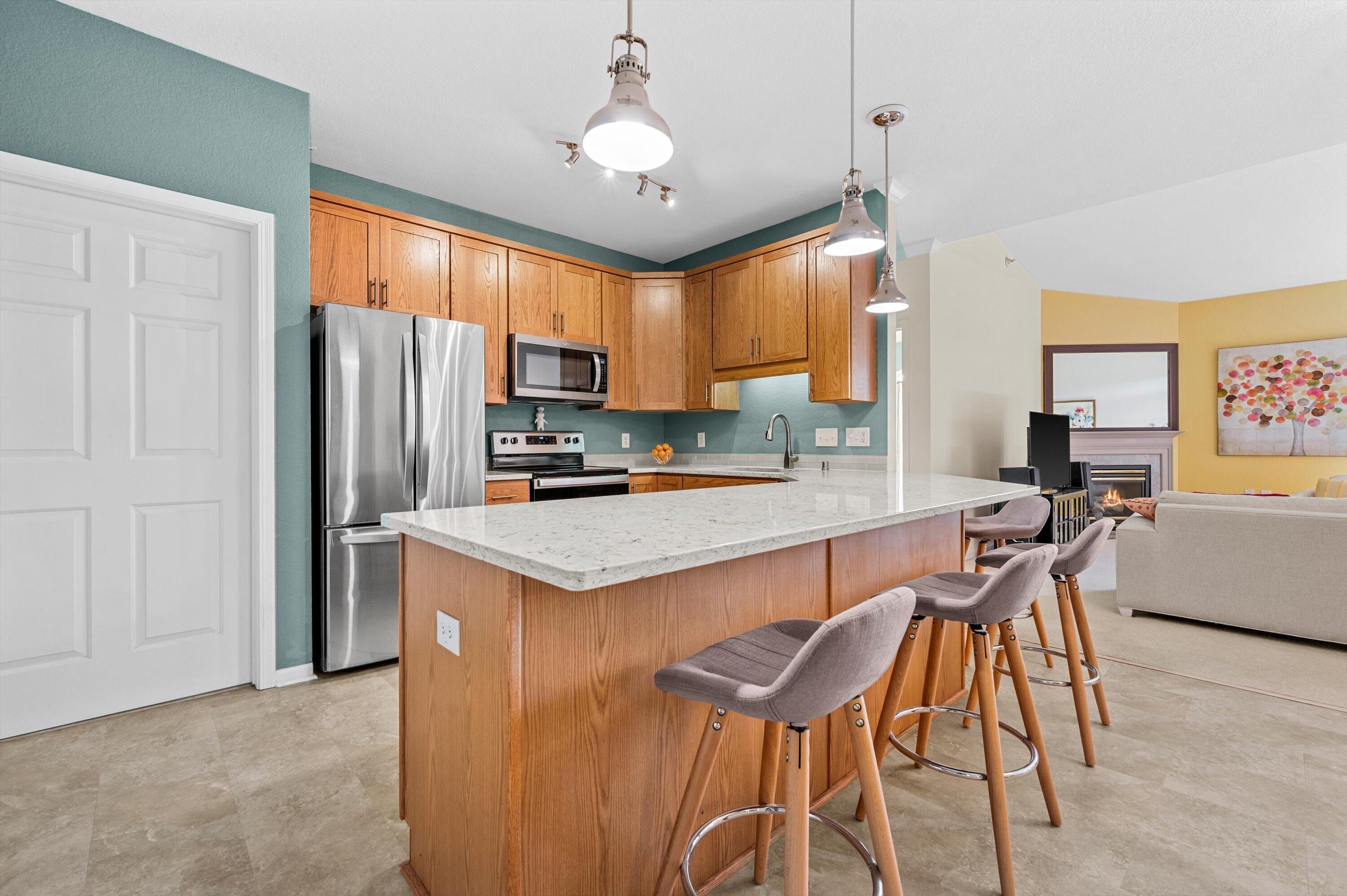 13050 West Bluemound Road, Unit 307 Elm Grove, WI 53122 - Photo 5 of 29 Plenty of side-bar comversation