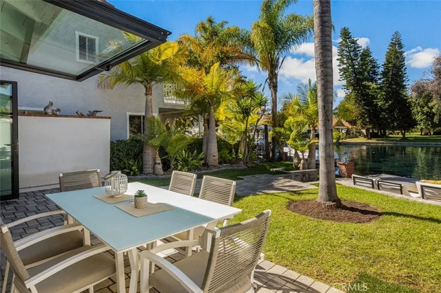 a lake view with a wooden fence and lake view