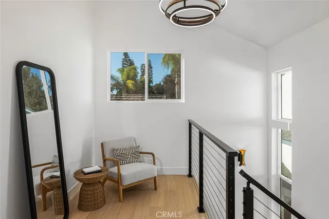 a spacious bedroom with a bed and a cabinets