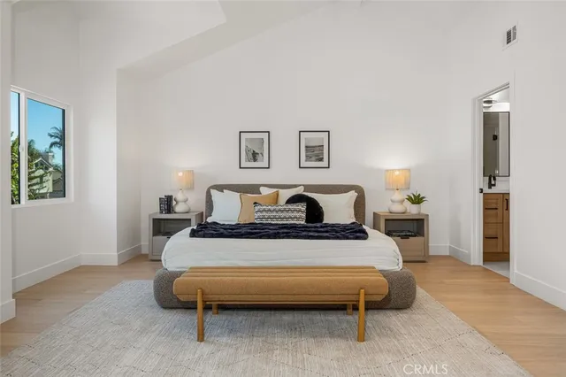 a bathroom with a granite countertop sink a shower and a mirror
