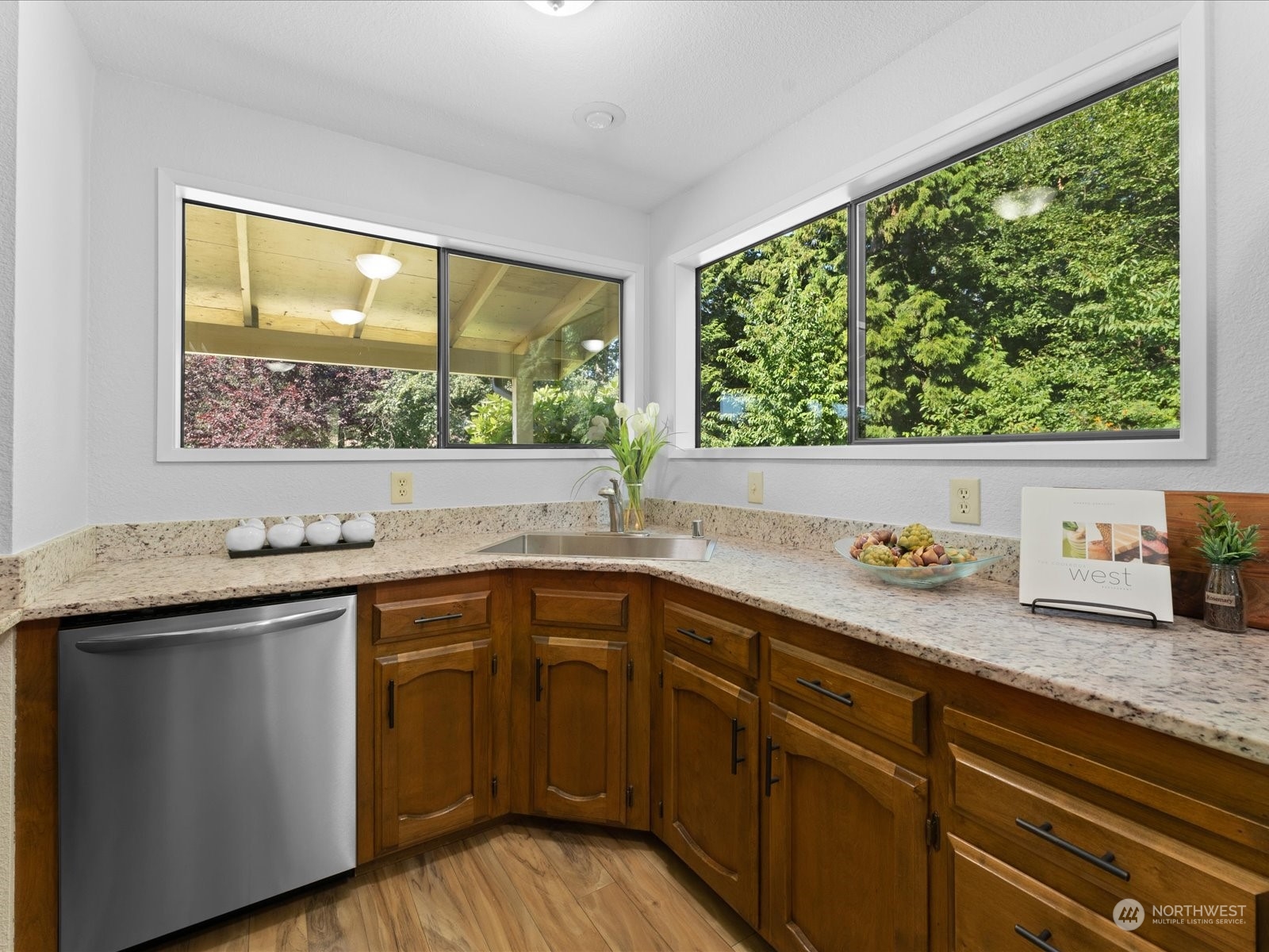 3119 Mountain View Road Ferndale, WA 98248 - Photo 19 of 40 a kitchen with a sink and wooden cabinets