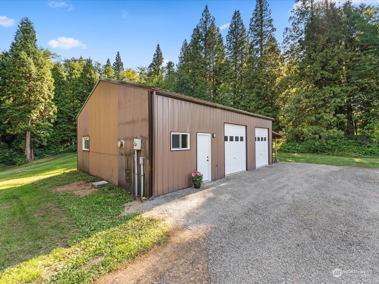 3119 Mountain View Road Ferndale, WA 98248 - Photo 35 of 40 a view of a house with backyard and garden
