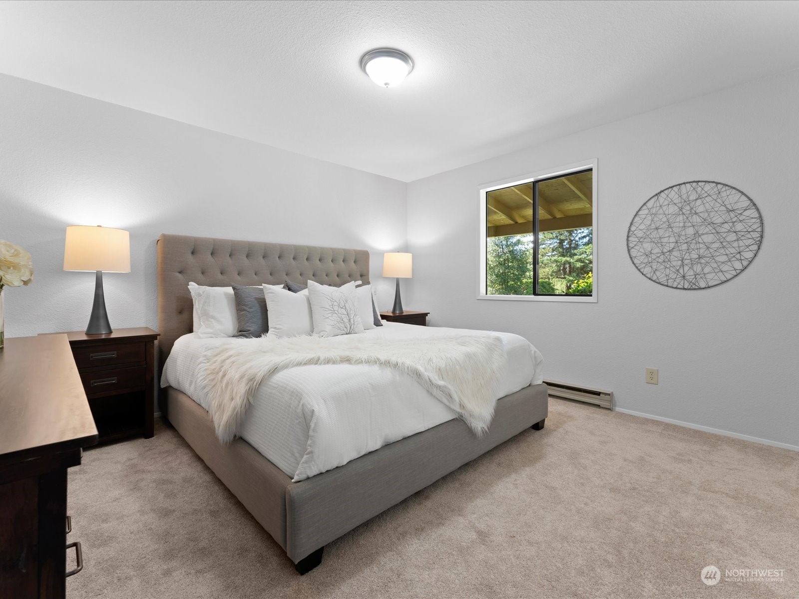 3119 Mountain View Road Ferndale, WA 98248 - Photo 10 of 40 a bedroom with a bed and a window