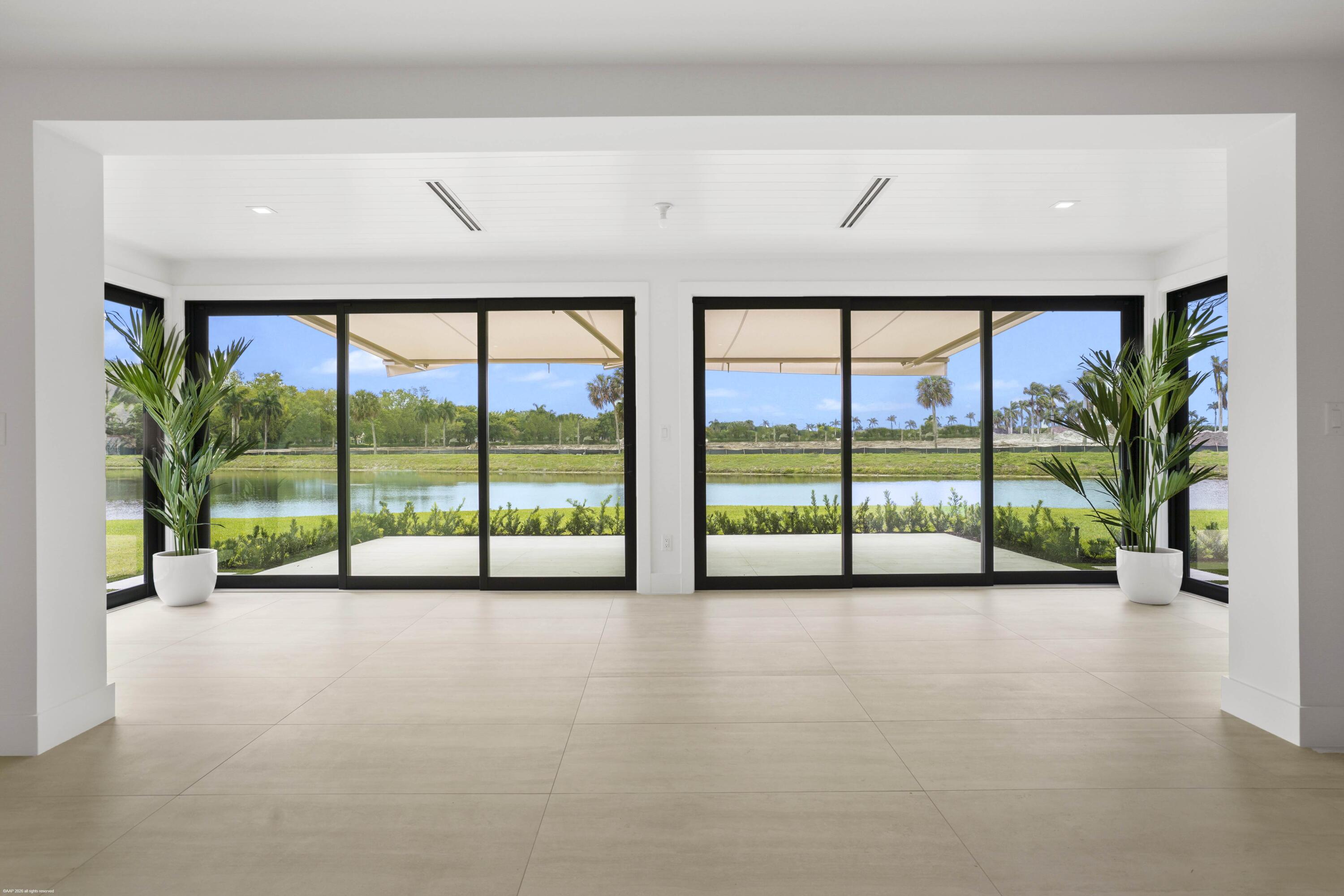 13254 Polo Club Road, Unit C101 Wellington, FL 33414 - Photo 15 of 71 a view of an empty room with a large window