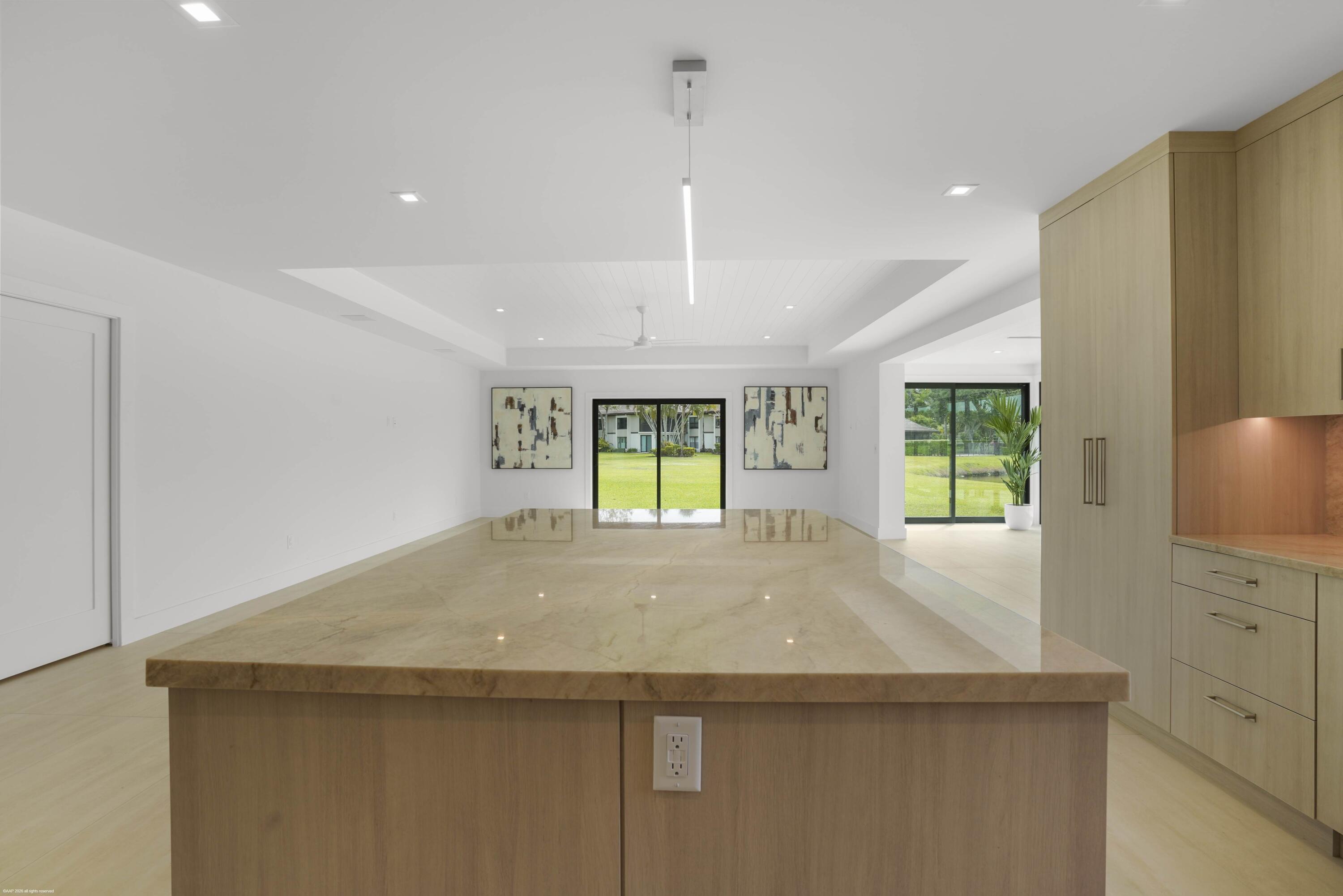 13254 Polo Club Road, Unit C101 Wellington, FL 33414 - Photo 21 of 71 a kitchen with a stove and a sink