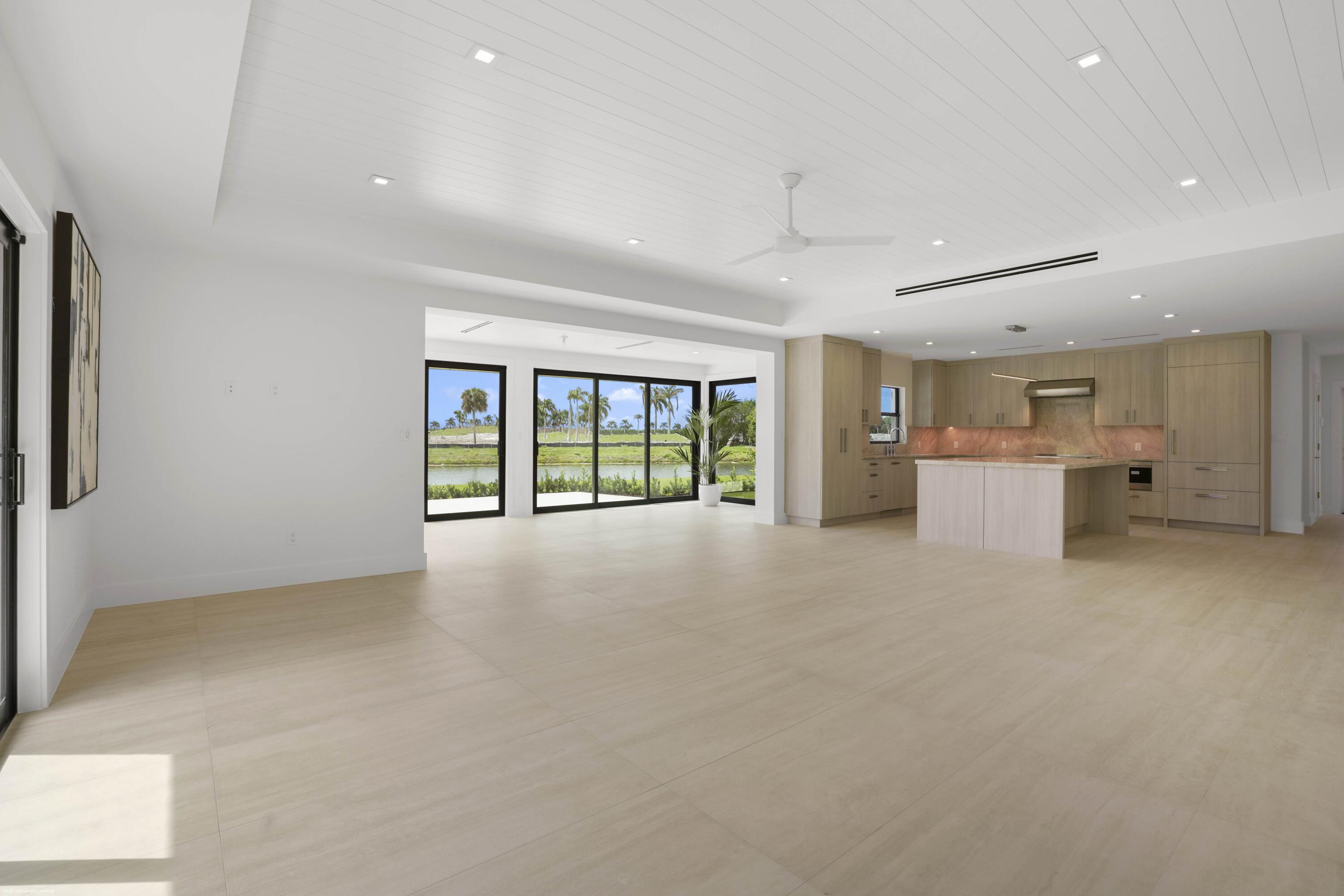 13254 Polo Club Road, Unit C101 Wellington, FL 33414 - Photo 22 of 71 a view of an empty room with a window