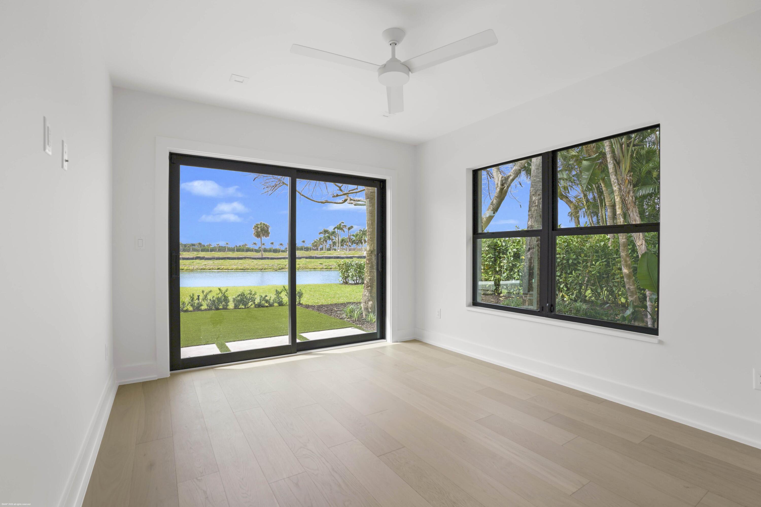 13254 Polo Club Road, Unit C101 Wellington, FL 33414 - Photo 25 of 71 an empty room with windows and city view