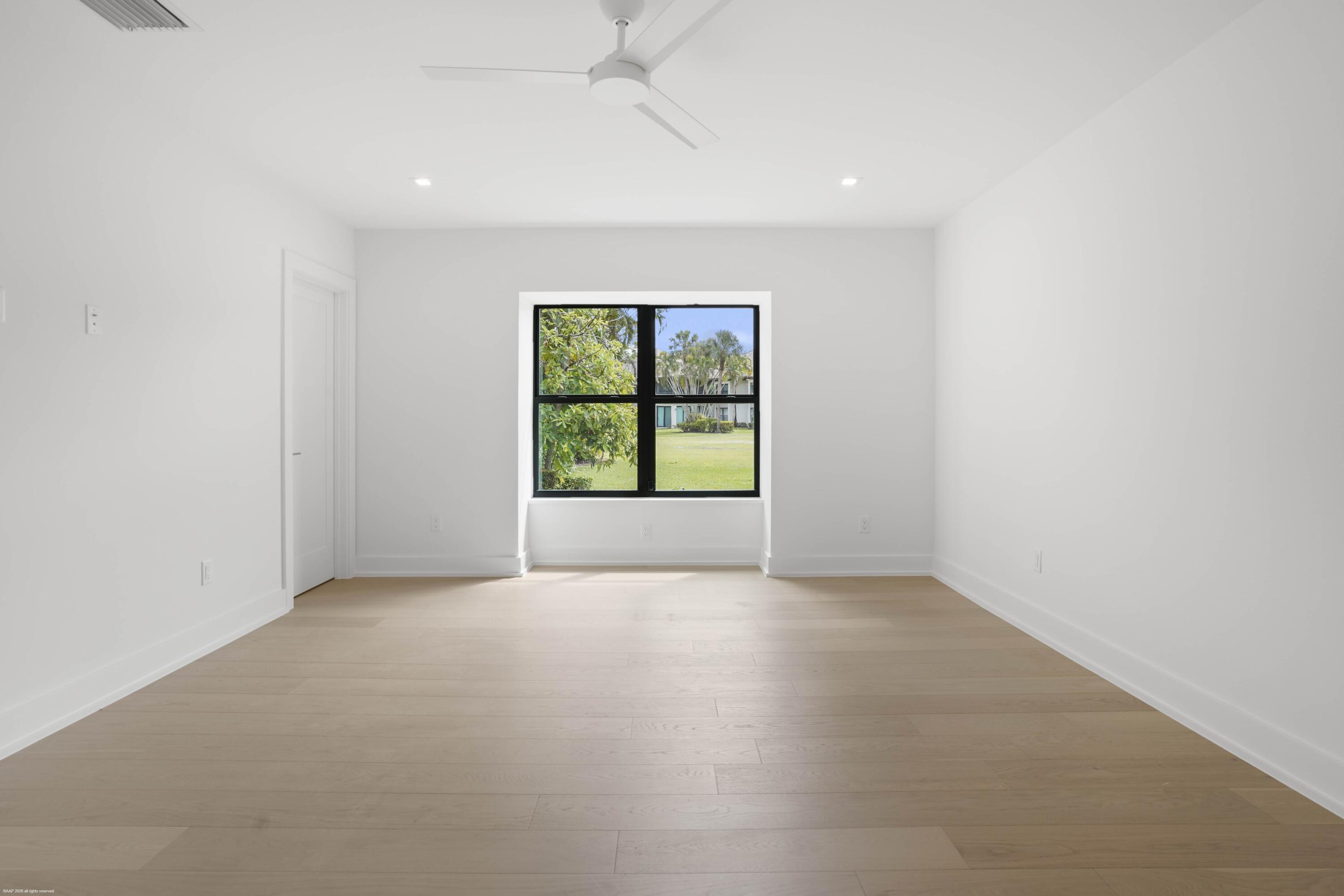 13254 Polo Club Road, Unit C101 Wellington, FL 33414 - Photo 32 of 71 an empty room with windows and closet