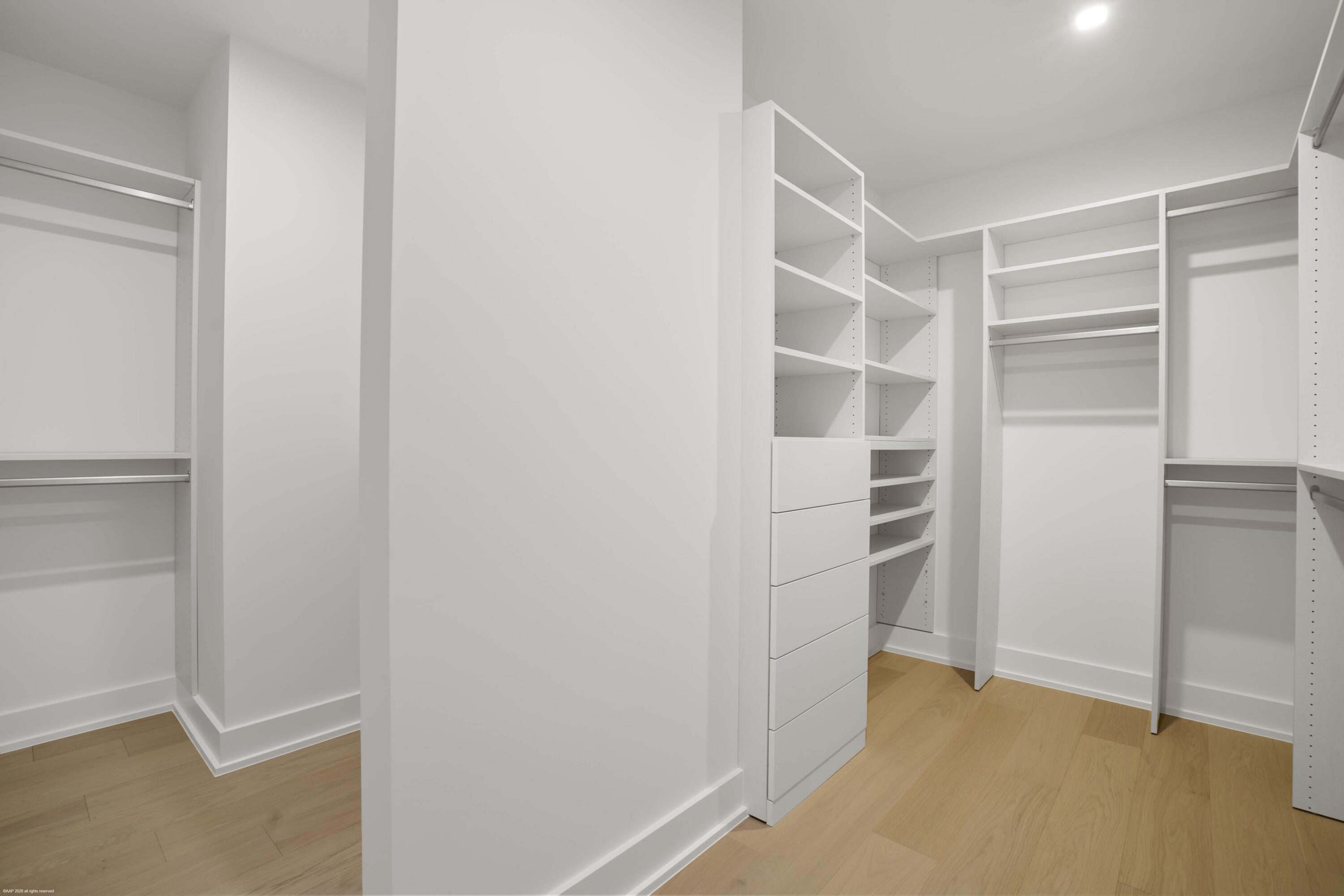 13254 Polo Club Road, Unit C101 Wellington, FL 33414 - Photo 34 of 71 a view of walk in closet with empty racks