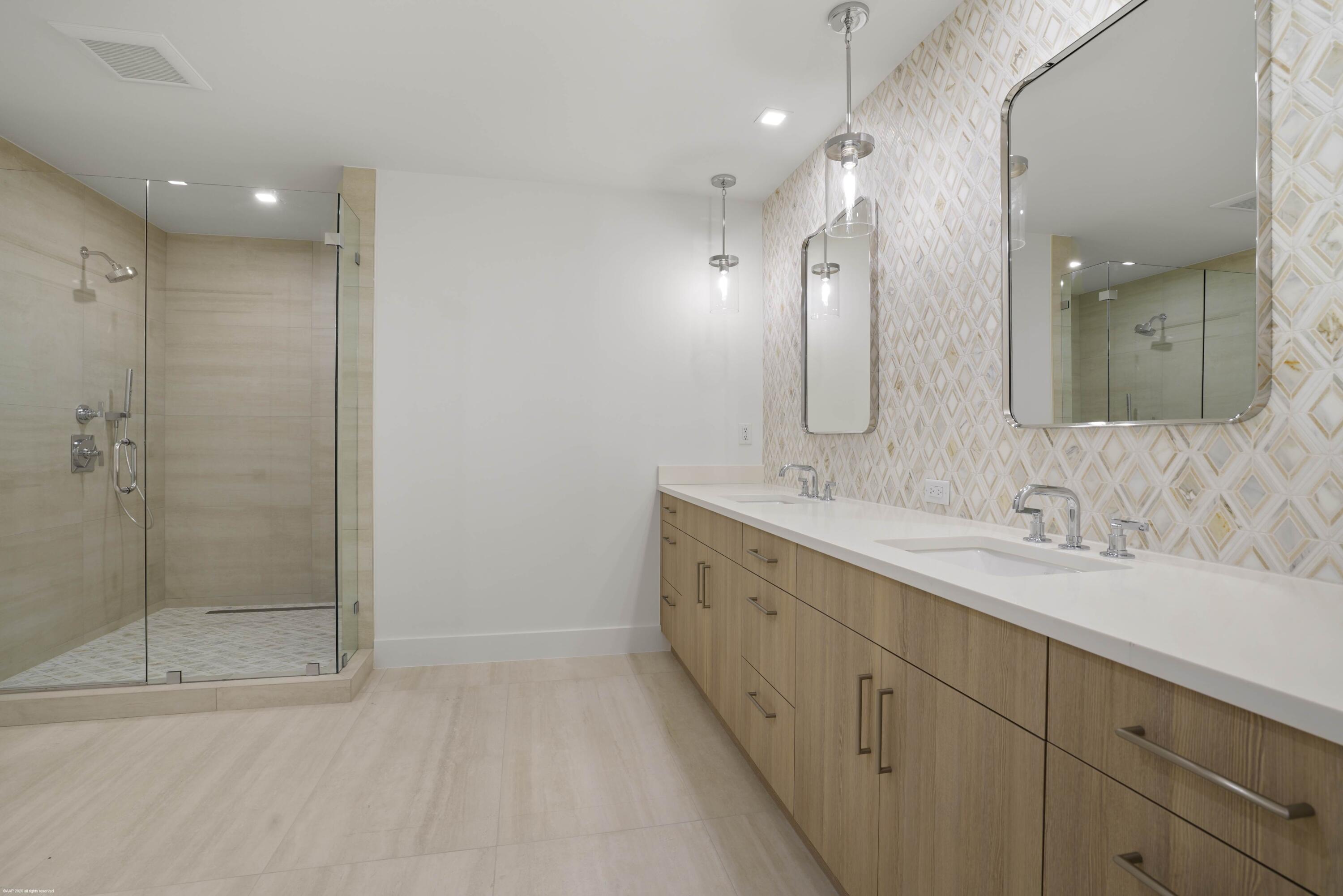 13254 Polo Club Road, Unit C101 Wellington, FL 33414 - Photo 38 of 71 a spacious bathroom with double sink and shower