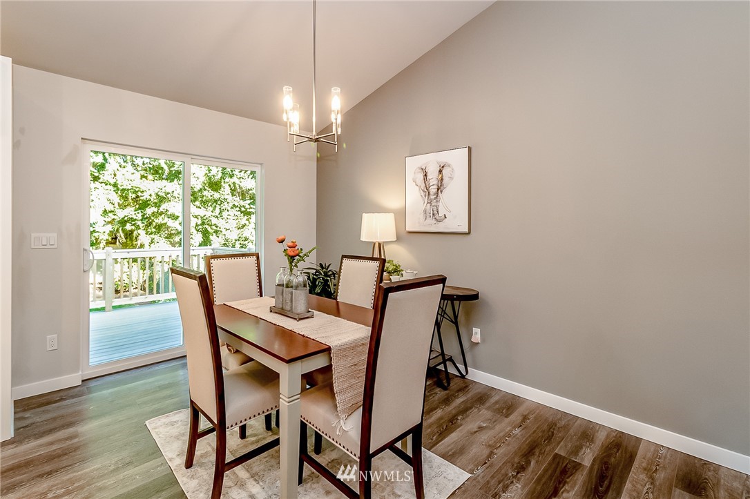 17702 30th Drive Southeast Bothell, WA 98012 - Photo 6 of 17 a view of a dining room with furniture window and wooden floor
