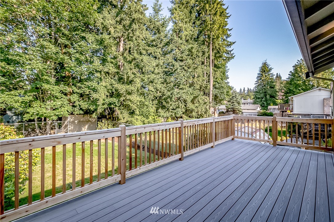 17702 30th Drive Southeast Bothell, WA 98012 - Photo 7 of 17 a view of balcony with wooden floor and fence