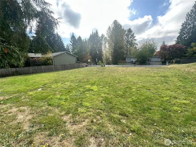 a view of outdoor space and yard