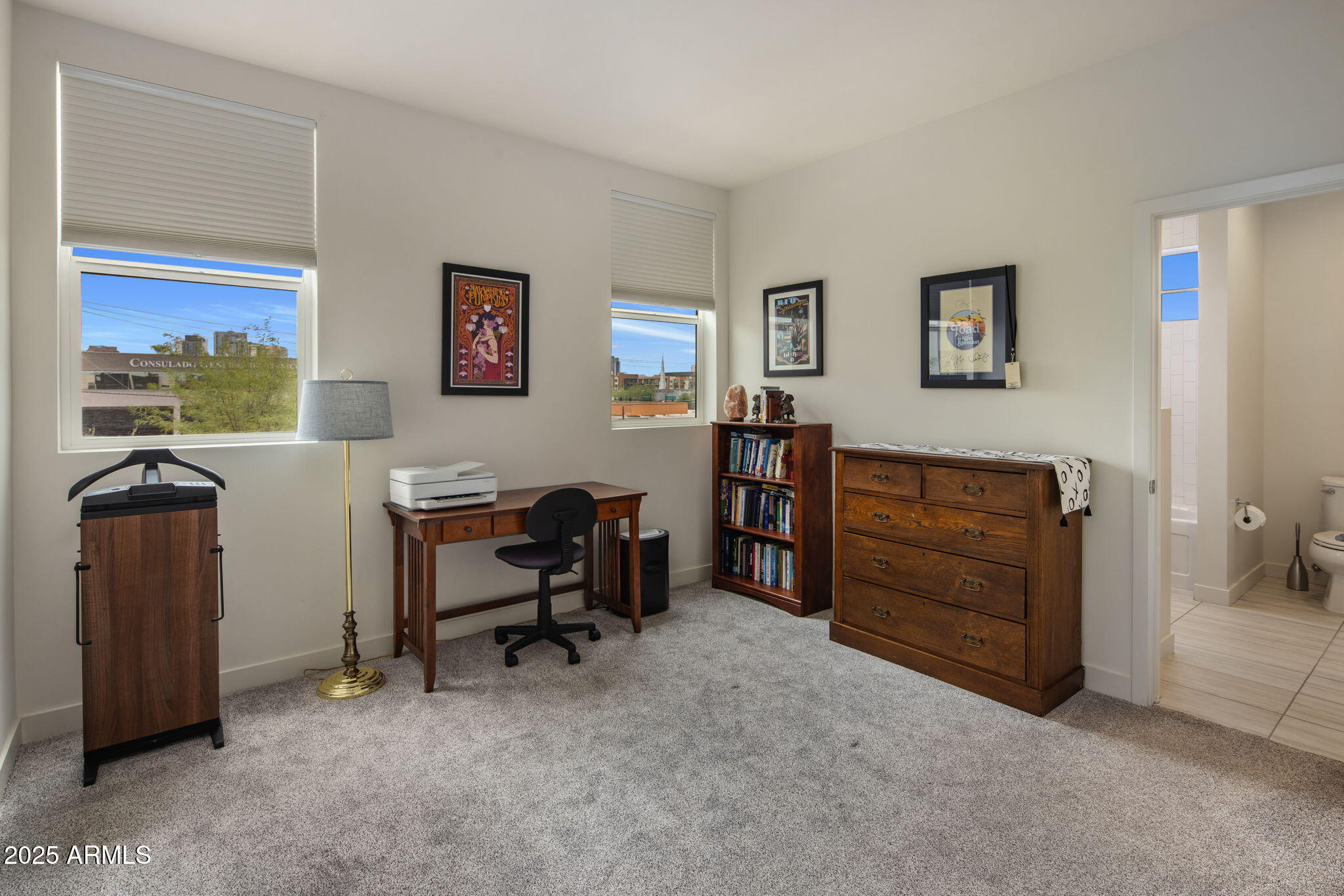 325 East Coronado Road, Unit 19 Phoenix, AZ 85004 - Photo 12 of 25 a view of a workspace with furniture and a window