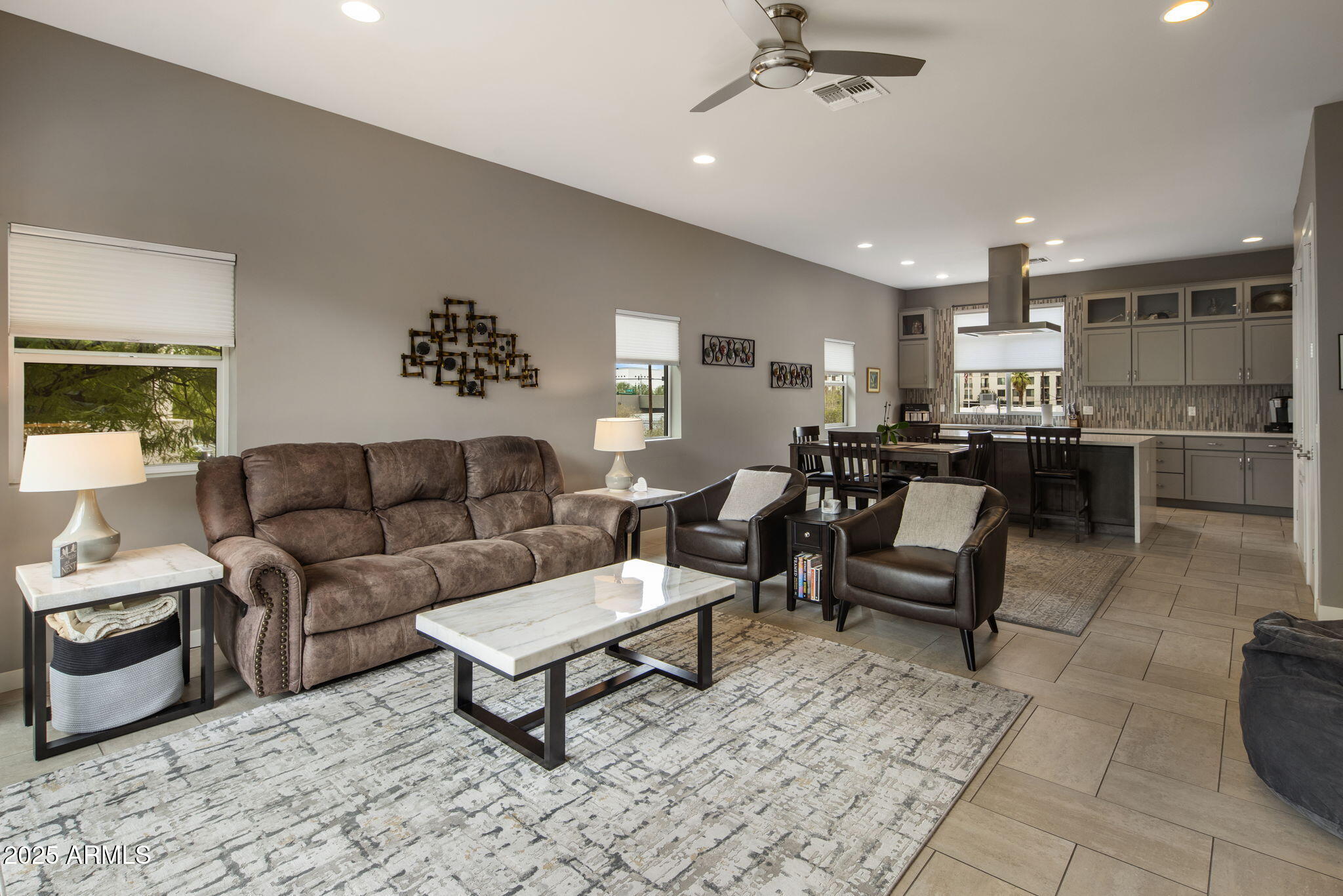 325 East Coronado Road, Unit 19 Phoenix, AZ 85004 - Photo 3 of 25 a living room with furniture and kitchen view
