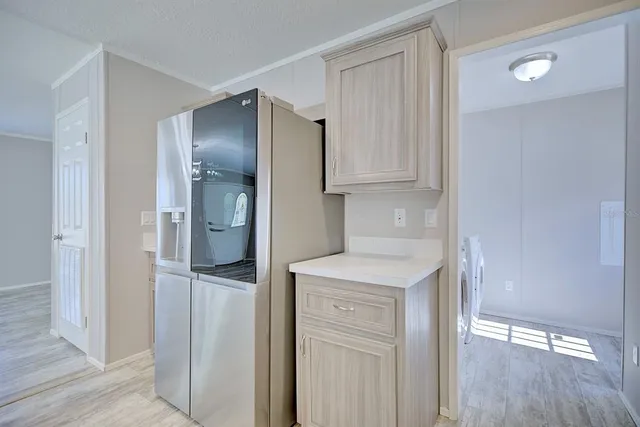 a view of kitchen and washer and dryer