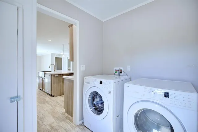 a view of livingroom with washer and dryer