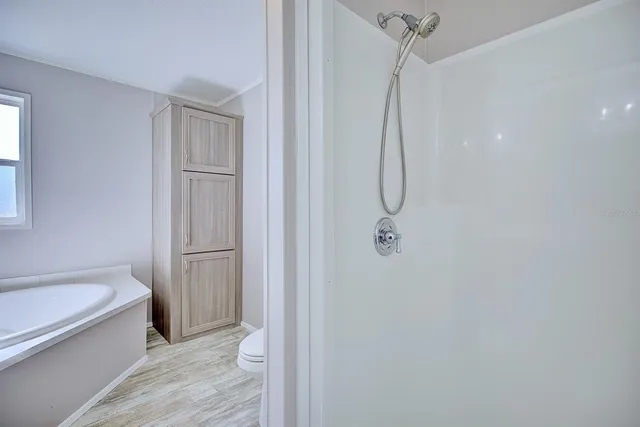 a view of a house with backyard