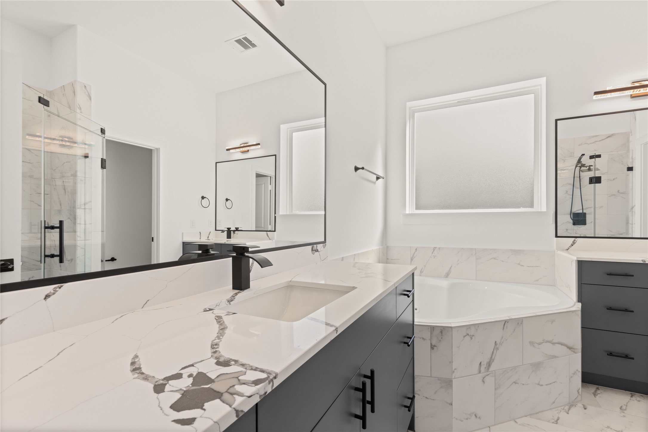 2709 Dennis Street Houston, TX 77004 - Photo 9 of 20 a bathroom with a sink and a mirror