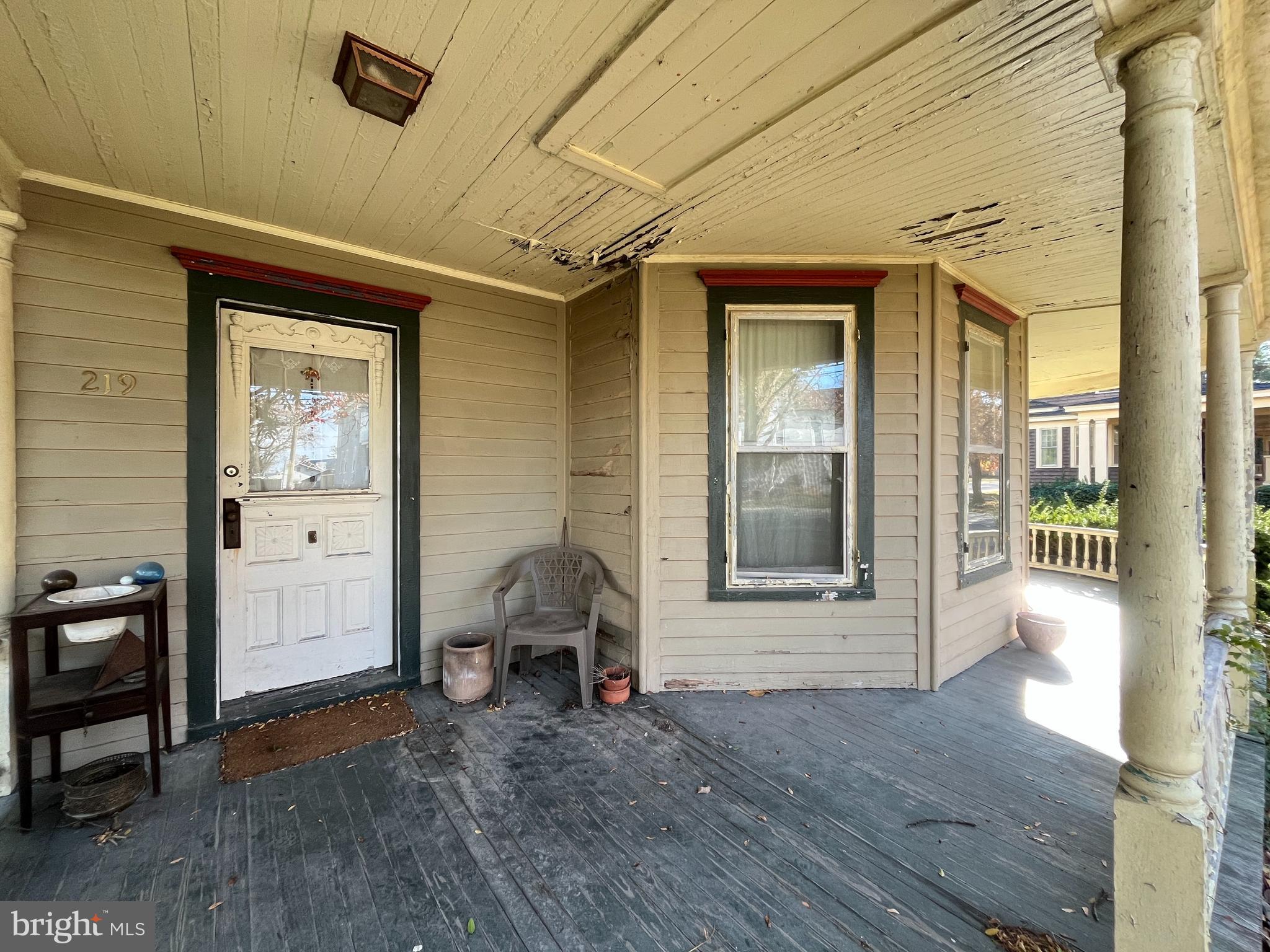 219 South Main Street Hurlock, MD 21643 - Photo 5 of 23 a view of livingroom with furniture and wooden floor
