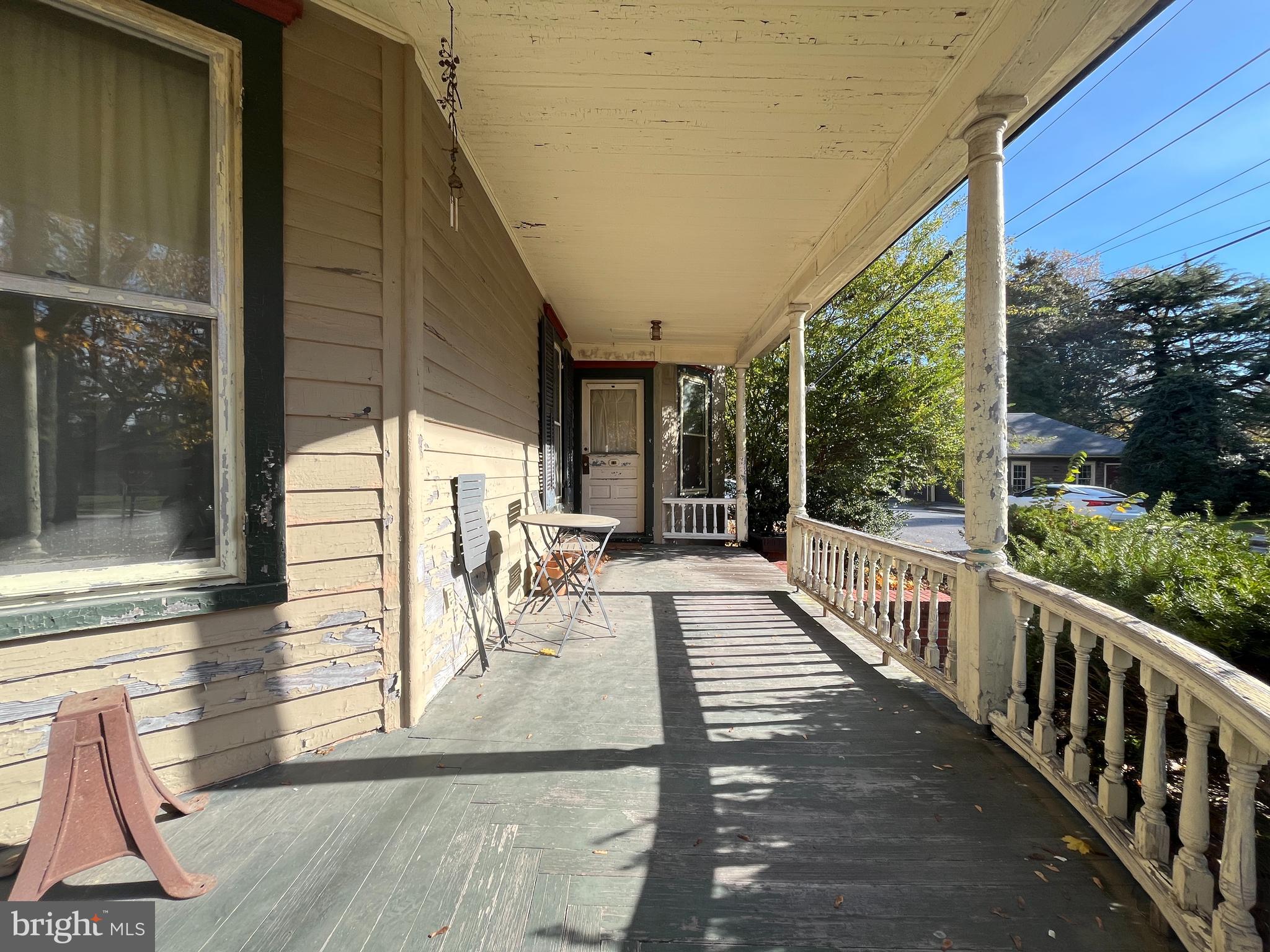 219 South Main Street Hurlock, MD 21643 - Photo 6 of 23 a view of a patio with a dining table and chairs