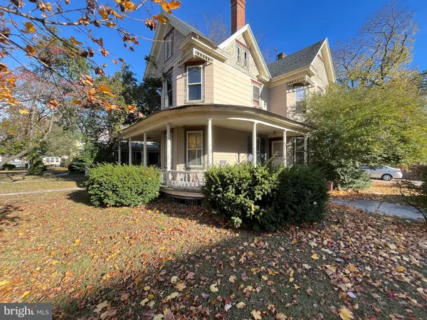 a front view of a house with yard