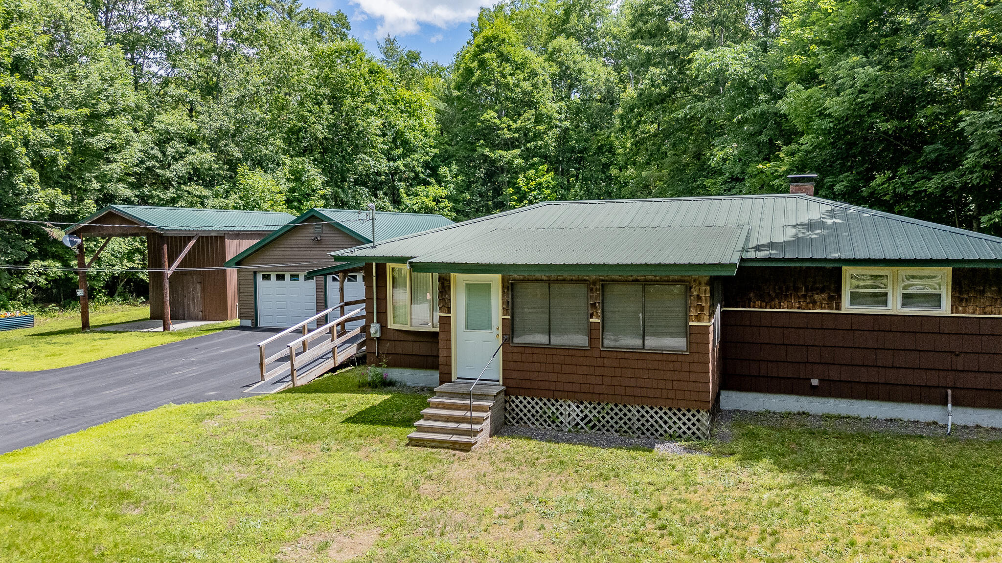 19 Summer Street Milo, ME 04463 - Photo 1 of 53 DJI_20260625115830_0002_D