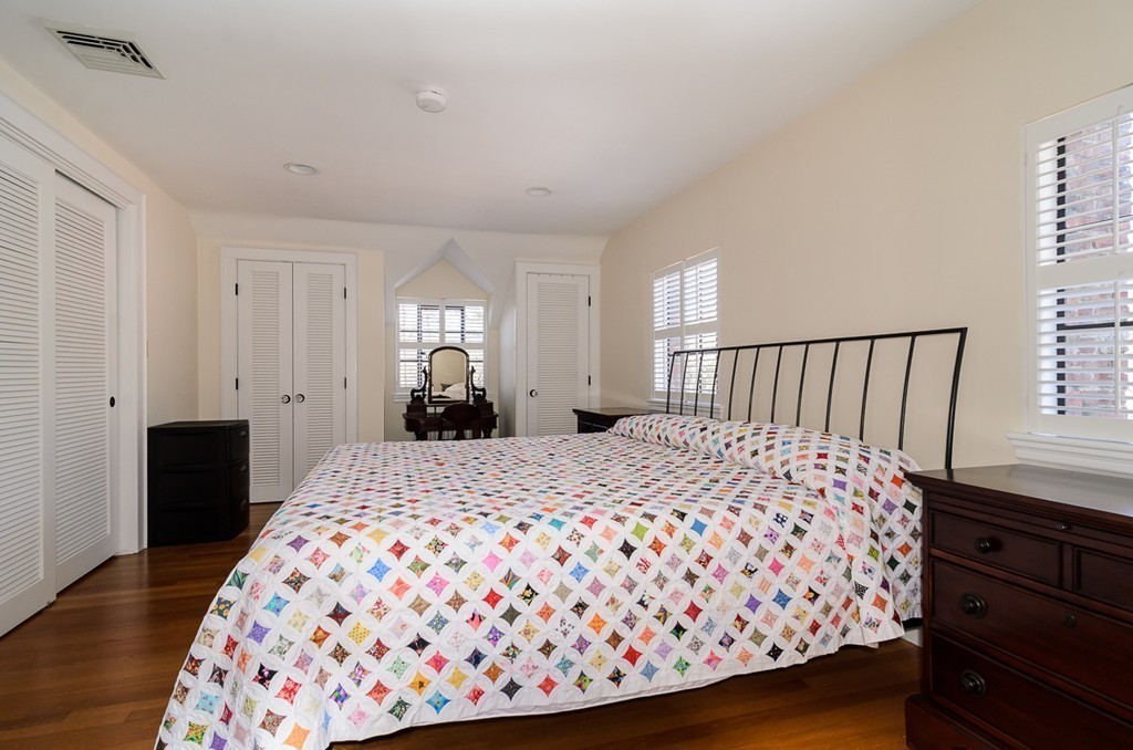 32 Sunset Road Wellesley, MA 02482 - Photo 11 of 23 a bedroom with a bed and wooden floor