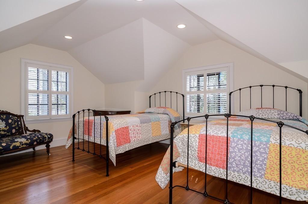 32 Sunset Road Wellesley, MA 02482 - Photo 13 of 23 a spacious bedroom with two beds and wooden floor