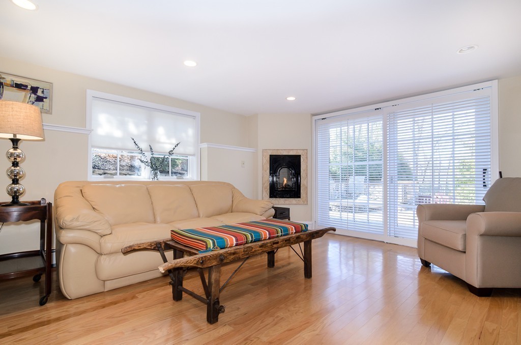 32 Sunset Road Wellesley, MA 02482 - Photo 15 of 23 a living room with furniture and a flat screen tv
