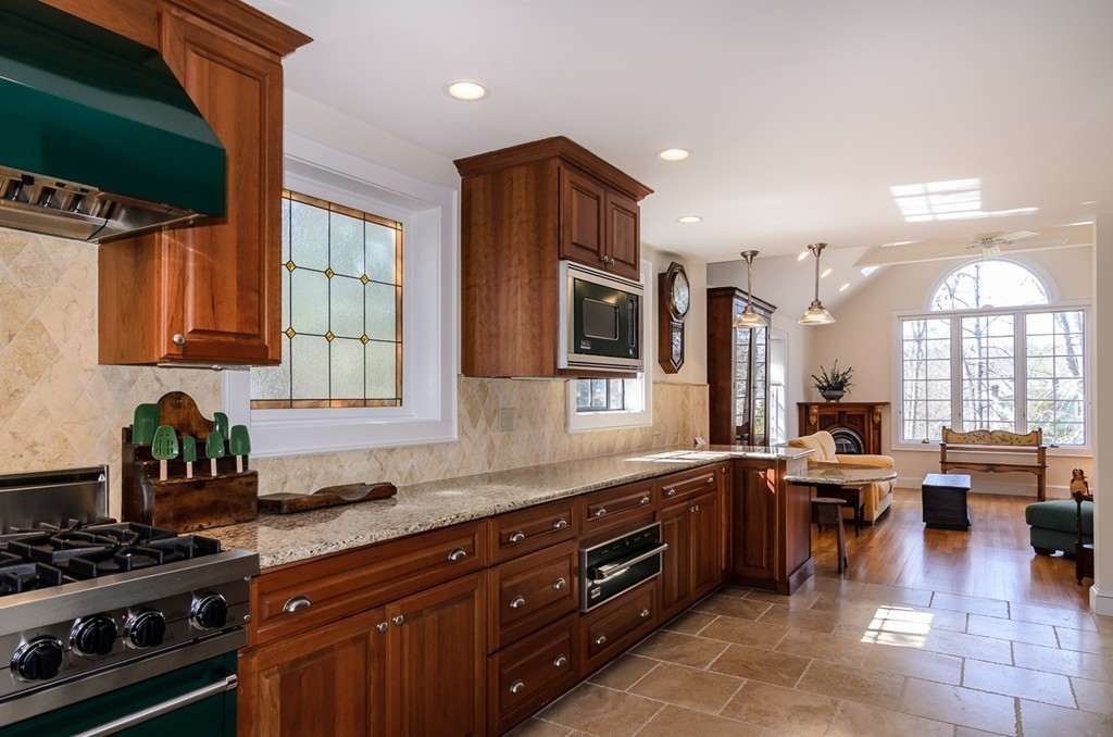 32 Sunset Road Wellesley, MA 02482 - Photo 5 of 23 a kitchen with lots of counter top space and stove