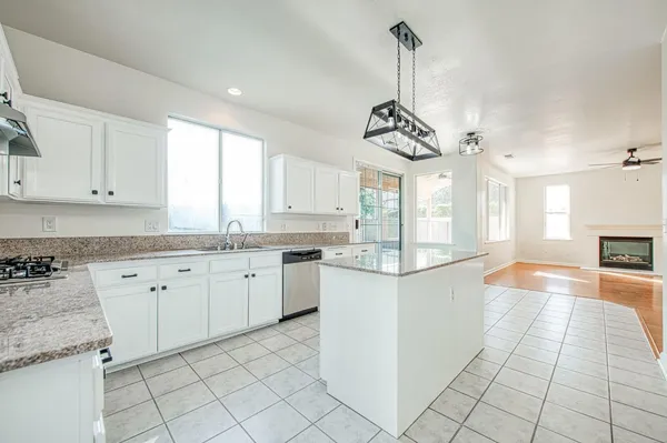 a view of a storage & utility room with a window