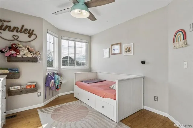 a bed room with a bed and a window