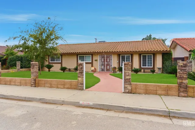 front view of house with a small yard