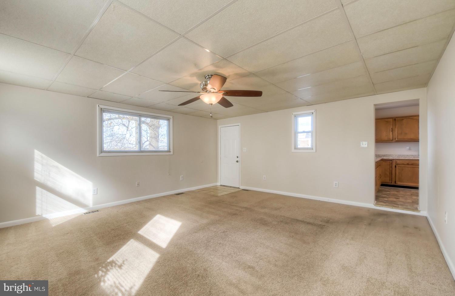 4202 Belle Grove Road Baltimore, MD 21225 - Photo 13 of 31 a view of an empty room with a window