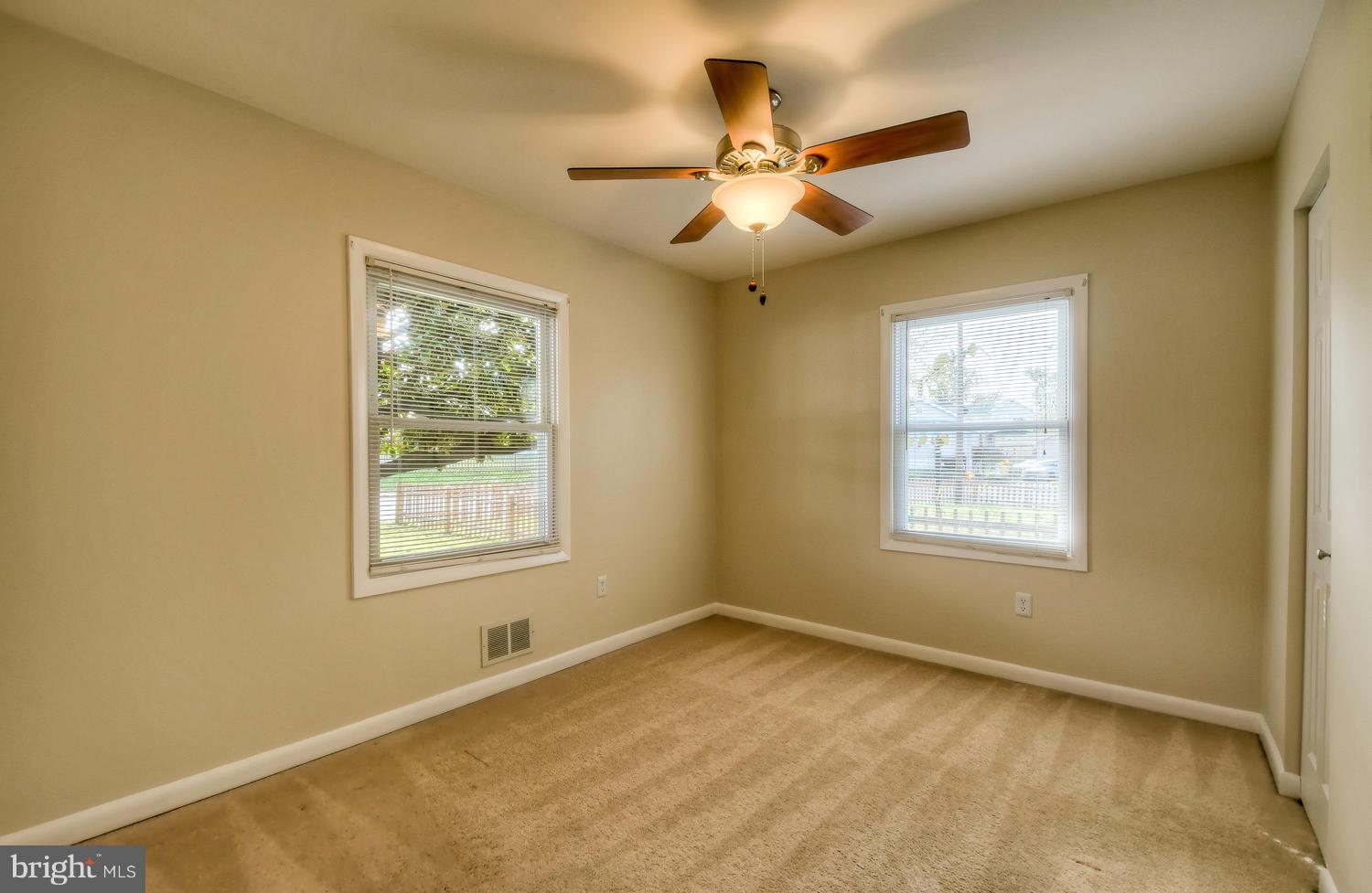 4202 Belle Grove Road Baltimore, MD 21225 - Photo 14 of 31 a view of an empty room with a window