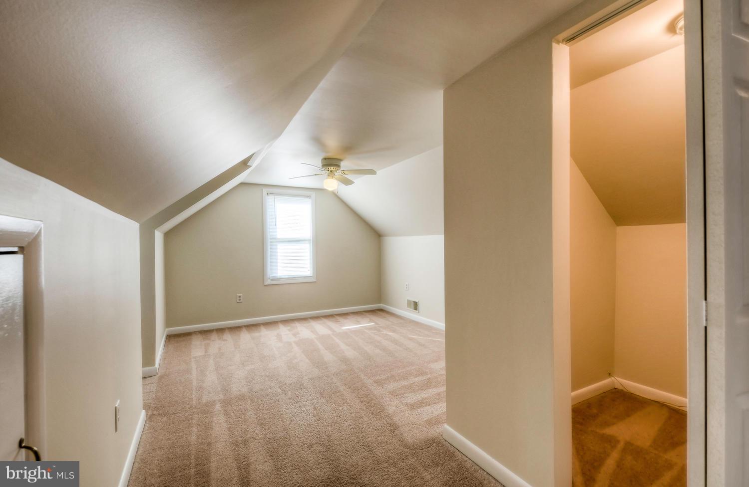 4202 Belle Grove Road Baltimore, MD 21225 - Photo 21 of 31 an empty room with windows and closet