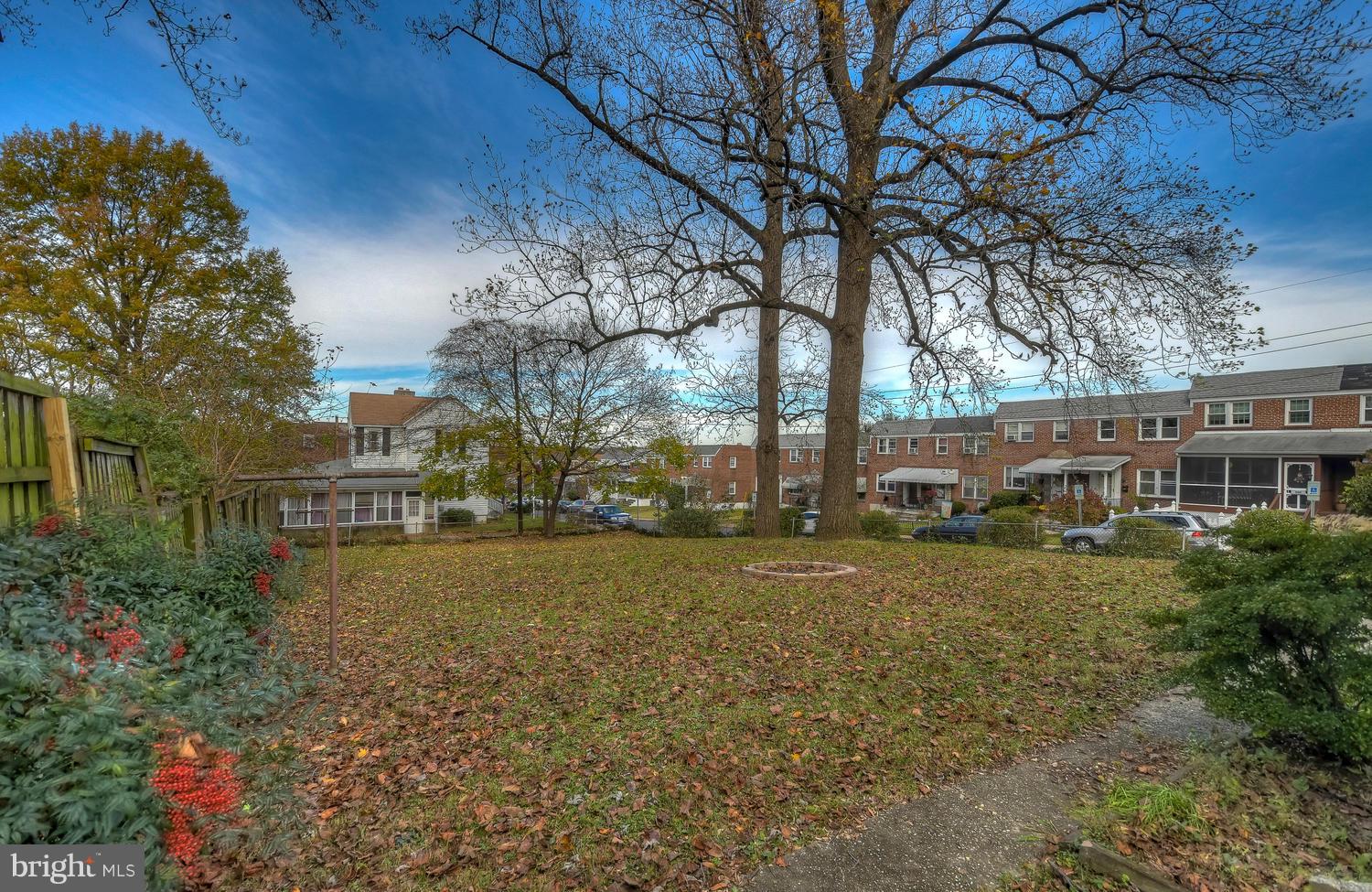 4202 Belle Grove Road Baltimore, MD 21225 - Photo 28 of 31 a view of a big yard with plants and large trees