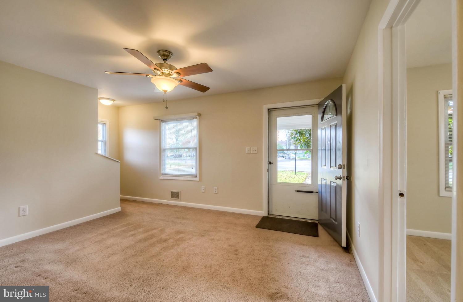 4202 Belle Grove Road Baltimore, MD 21225 - Photo 7 of 31 a view of an empty room with a window