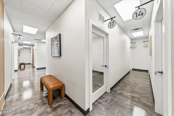 a view of a hallway with elevator
