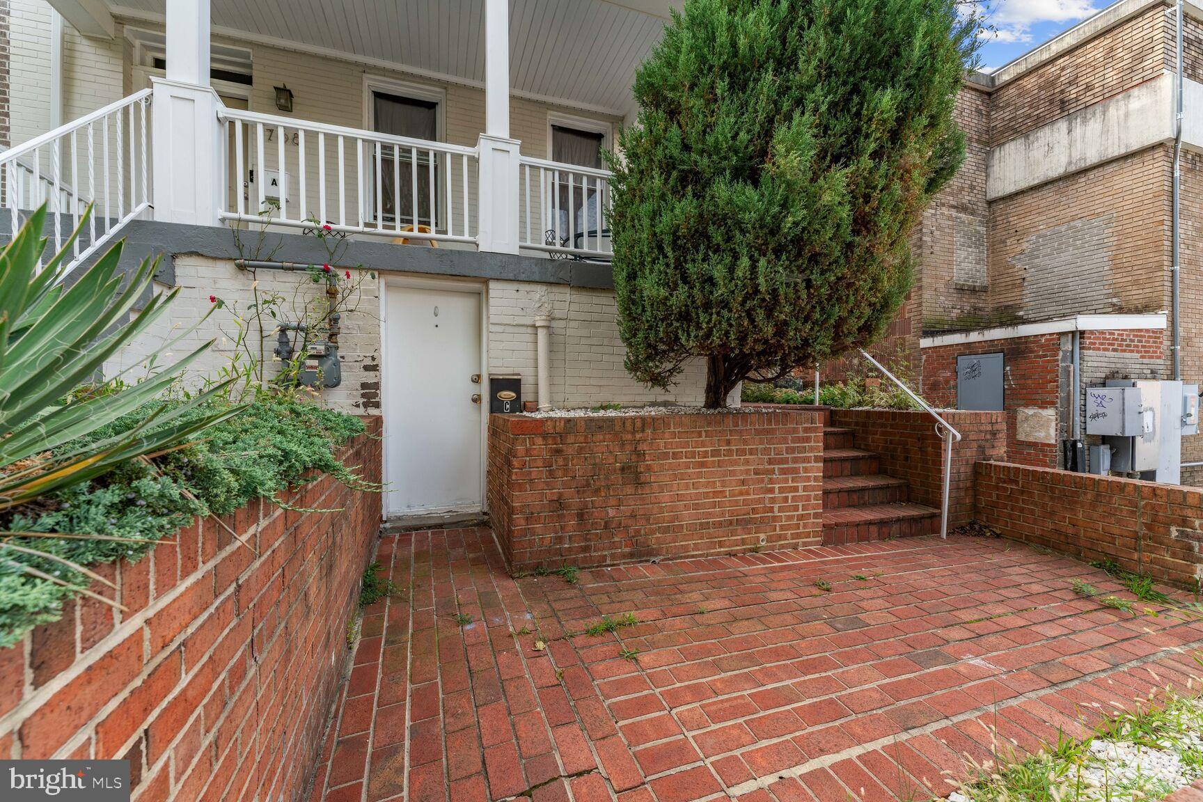 768 Quebec Place Northwest, Unit C Washington, DC 20010 - Photo 12 of 13 a view of entryway with wooden floor and fence
