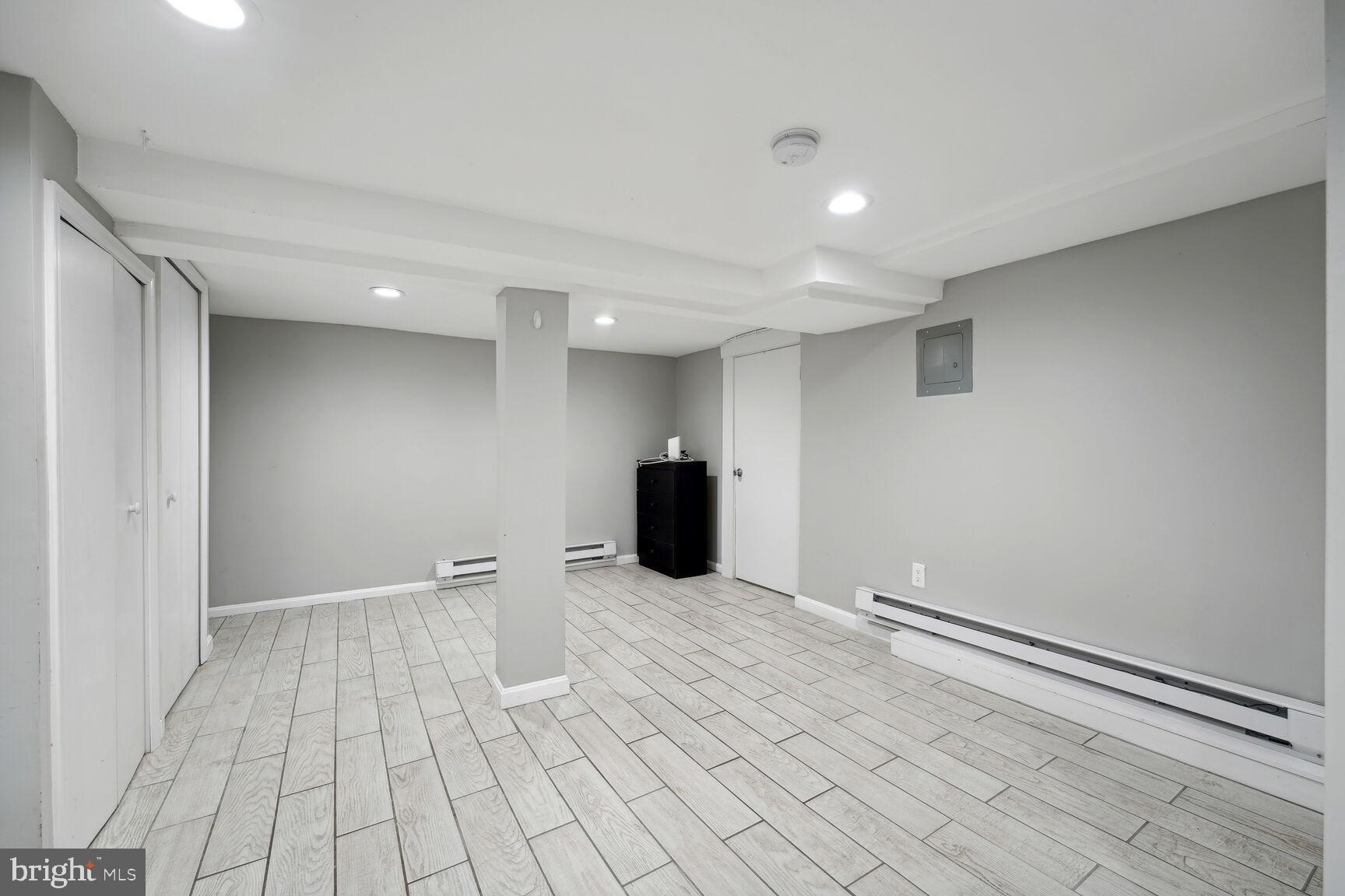 768 Quebec Place Northwest, Unit C Washington, DC 20010 - Photo 7 of 13 a view of an empty room with wooden floor