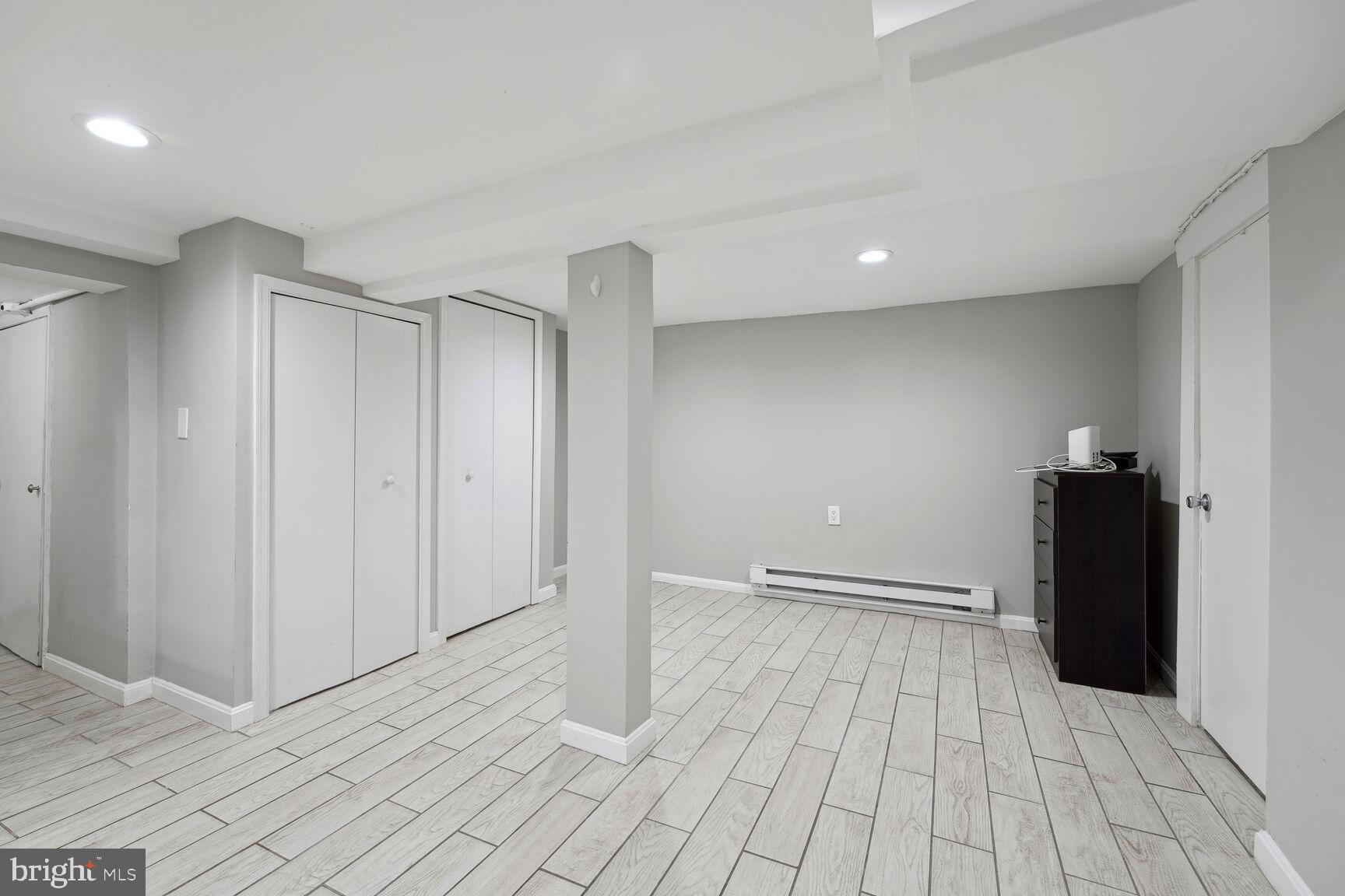 768 Quebec Place Northwest, Unit C Washington, DC 20010 - Photo 8 of 13 a view of empty room with wooden floor