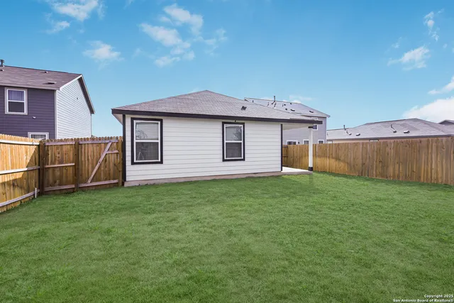 a view of a backyard with a garden