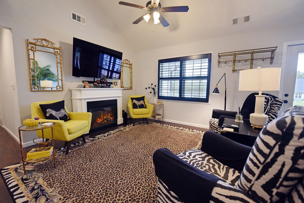 54 Linda Lane Blue Ridge, GA 30513 - Photo 13 of 59 a living room with furniture a flat screen tv and a fireplace